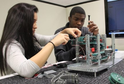 School kids working on a STEM project in class