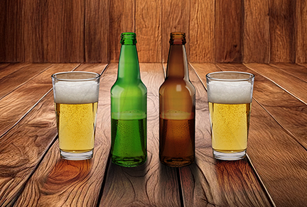 Bottles and glasses on a wooden table