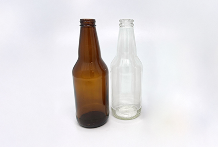 Glass beer bottles in clear and amber